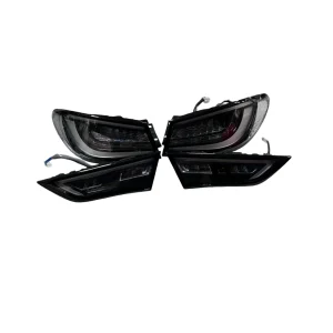 Full set of 4 handmade Infiniti Q60 black taillights Venom Series for 2018-2024 models on white background.